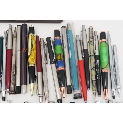 474 - A collection of pens, largely by Parker, also including two silver propelling pencils