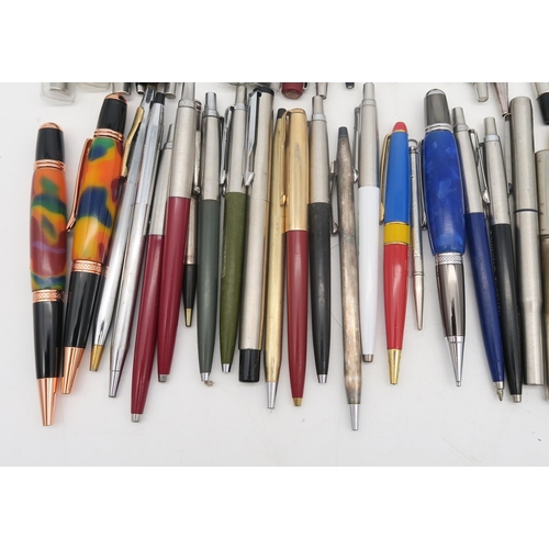 474 - A collection of pens, largely by Parker, also including two silver propelling pencils