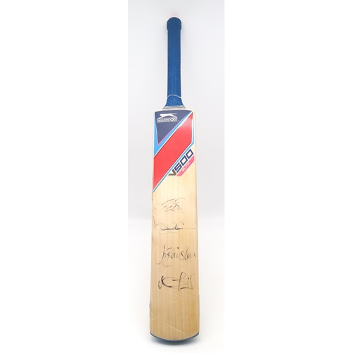 480 - A Slazenger V500 Elite willow cricket bat, bearing four players' signatures