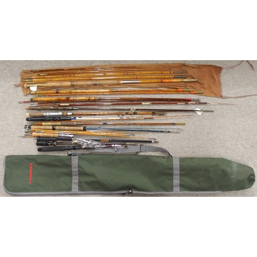 482 - A collection of fishing rods, including an S.Y-PS-18 telescopic example and a gaff