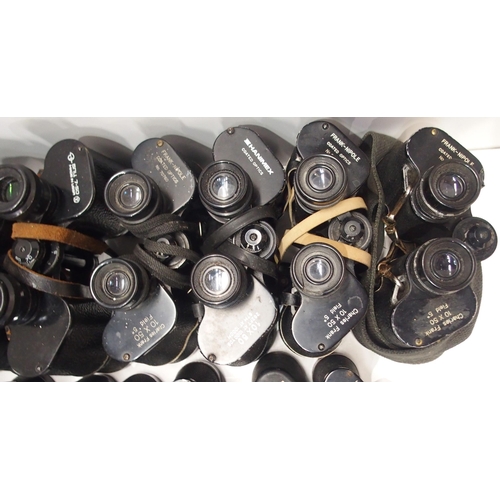 487 - A large quantity of vintage binoculars, with manufacturers including Frank-Nipole, Regent, Hanimex, ... 