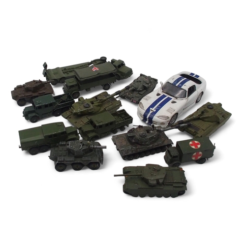 527 - A collection of model military vehicles, largely by Dinky, together with a further selection of mixe... 