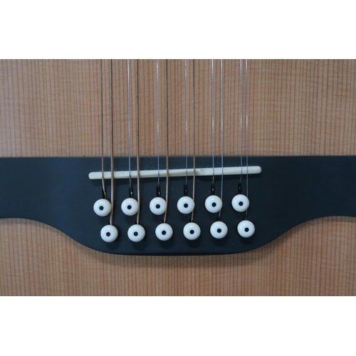 351 - A Godin A12 electro acoustic 12 string guitar serial number 20154152 with a Godin gig bag. This Cana... 