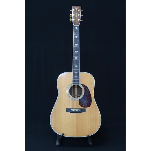 352 - A Martin D-41 dreadnought 6 string acoustic guitar serial number 1012136 made in 2004 with a Martin ... 