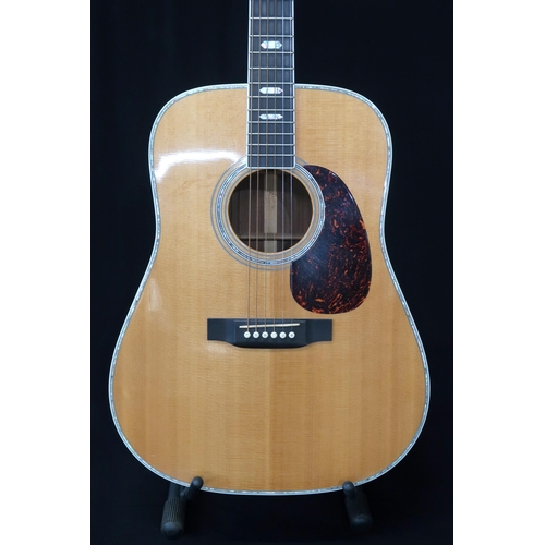 352 - A Martin D-41 dreadnought 6 string acoustic guitar serial number 1012136 made in 2004 with a Martin ... 