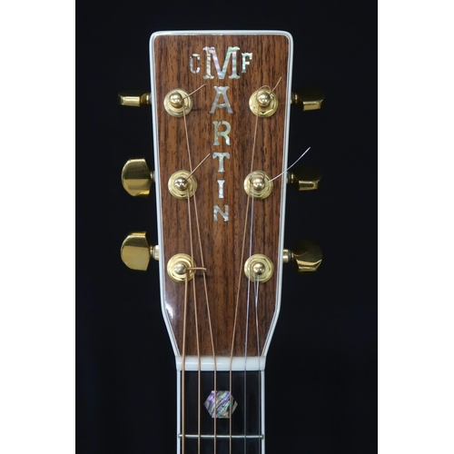 352 - A Martin D-41 dreadnought 6 string acoustic guitar serial number 1012136 made in 2004 with a Martin ... 