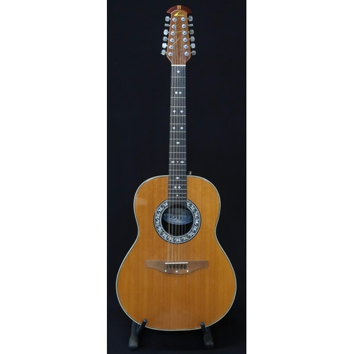 353 - An Ovation 12 string acoustic guitar, model 1155, serial number 307217 this 20 fret guitar come... 