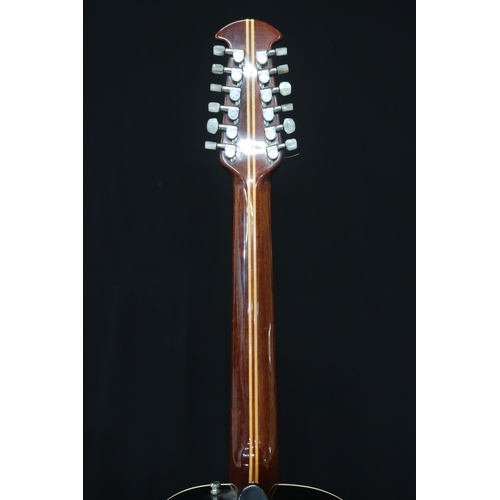 353 - An Ovation 12 string acoustic guitar, model 1155, serial number 307217 this 20 fret guitar come... 