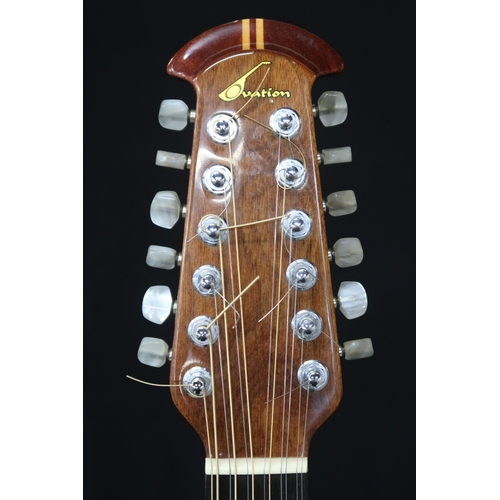 353 - An Ovation 12 string acoustic guitar, model 1155, serial number 307217 this 20 fret guitar come... 