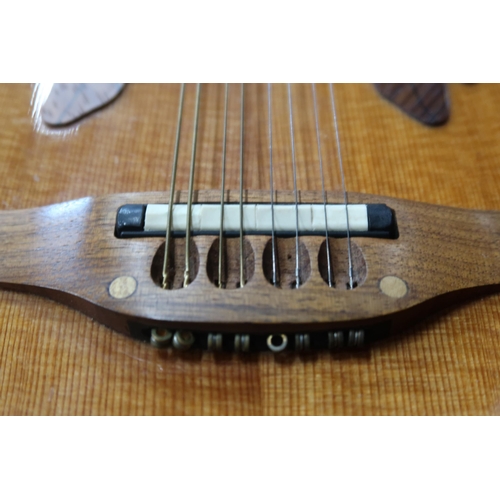 355 - An Ovation MM68 electro acoustic mandolin serial number 487287 featuring OP-24 electronics and cut a... 