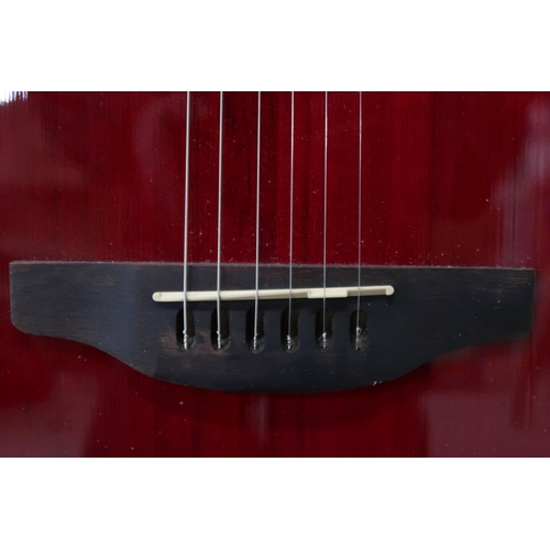 357 - An Ovation Celebrity electro acoustic six string guitar model CE44-RR in red, serial number CCV16022... 