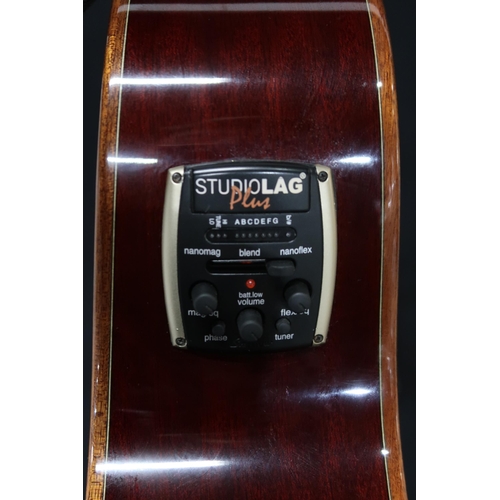 359 - A Studio LAG Tramontane electro acoustic six string guitar TN 100 ACE Auditorium Guitar in a natural... 