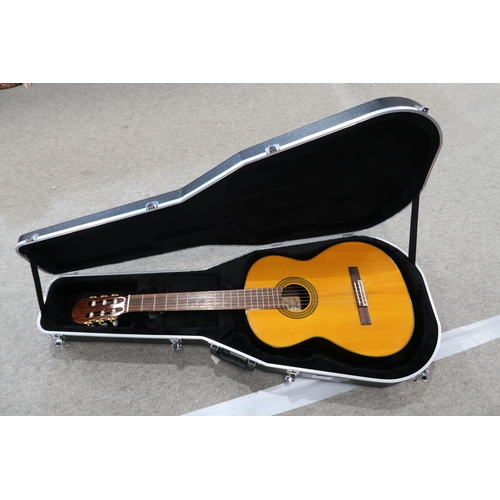 362 - A Takamine G Series six string classical acoustic guitar model number G128S 19 fret , nylon strung w... 