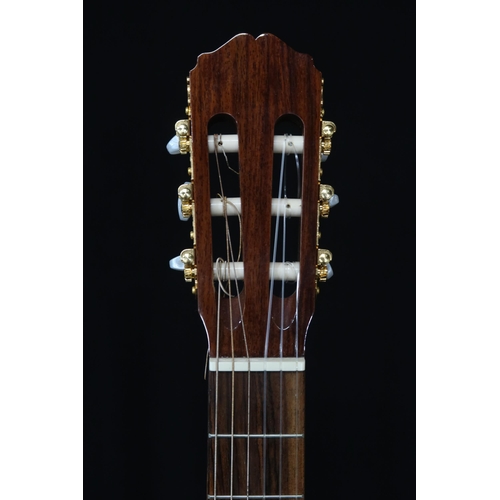 362 - A Takamine G Series six string classical acoustic guitar model number G128S 19 fret , nylon strung w... 