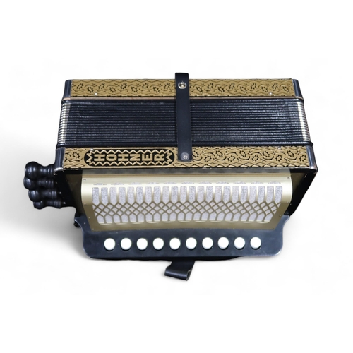 368 - A Hohner 4 stop 10 button melodeon the four voice 14 bellows melodeon comes together with a wooden c... 