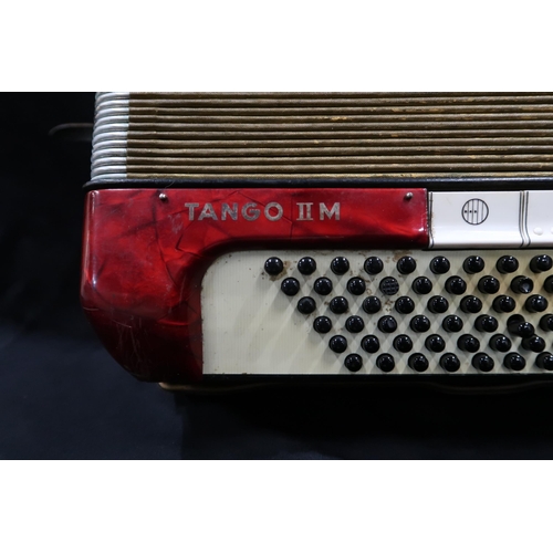 369 - A HOHNER TANGO II M 96 bass  37 key piano accordion in red with case