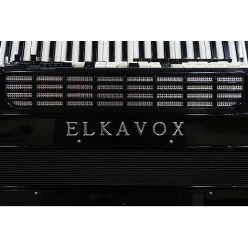 371 - An Elkavox 83 120 bass 41 key piano accordion with case 