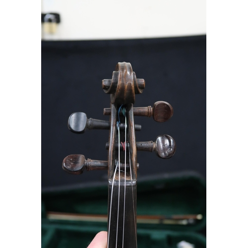 381 - A two piece back violin 35cm together with a bow 56 grams and case