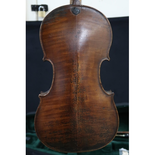 381 - A two piece back violin 35cm together with a bow 56 grams and case