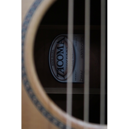 383 - A Tacoma six string acoustic guitar with faux tortoise shell trim model DM AC serial number H3070030... 