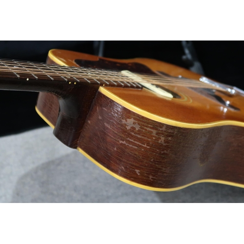 386 - GIBSON A vintage 1960's Gibson B-45 12 string acoustic guitar with natural finish and  tortoise shel... 