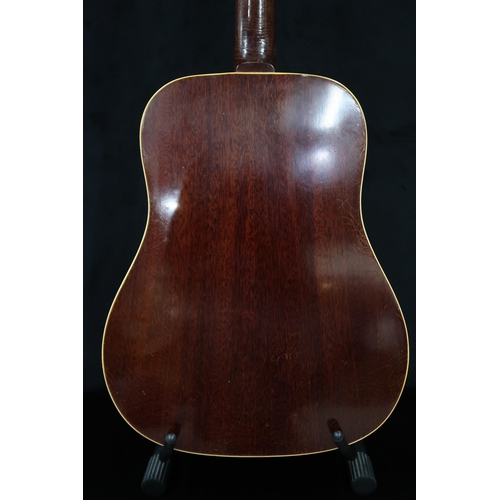 386 - GIBSON A vintage 1960's Gibson B-45 12 string acoustic guitar with natural finish and  tortoise shel... 