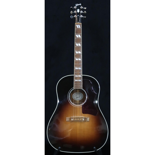 GIBSON a Gibson Southern Jumbo electro acoustic six string guitar in brown burst with a tortoise shell scratch plate serial number 114467074 with a Gibson fitted guitar case.