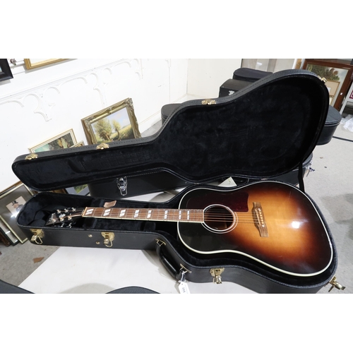 395 - GIBSON a Gibson Southern Jumbo electro acoustic six string guitar in brown burst with a tortoise she... 