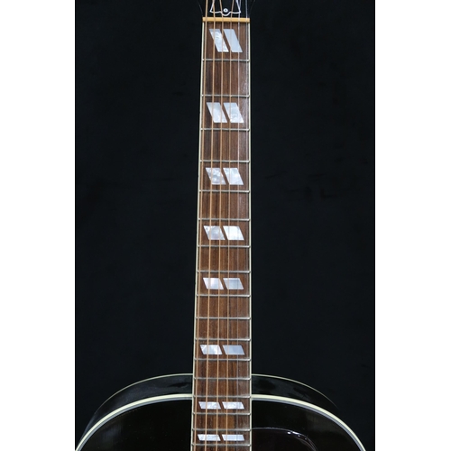 395 - GIBSON a Gibson Southern Jumbo electro acoustic six string guitar in brown burst with a tortoise she... 