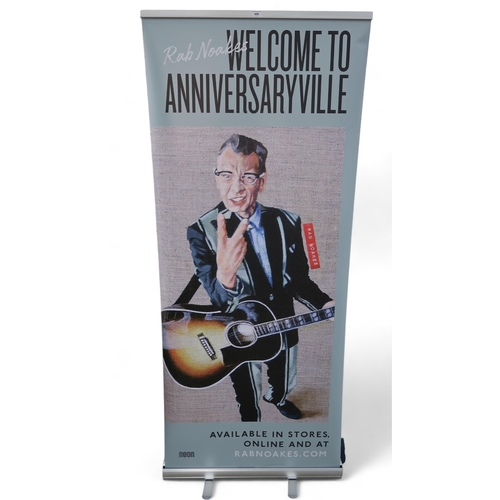 406 - Rab Noakes Welcome to Anniversary Ville a life sized record store promotional advertising sign toget... 