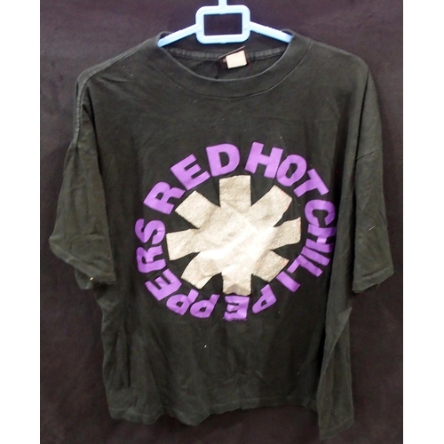 417 - A lot of various tour T Shirts with The Rolling Stones to include a leather cap, Red Hot Chilli Pepp... 