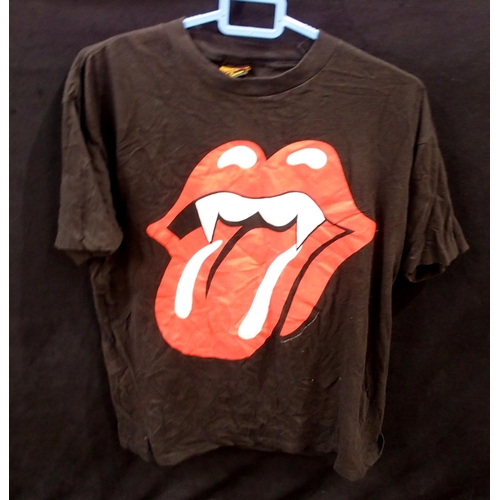 417 - A lot of various tour T Shirts with The Rolling Stones to include a leather cap, Red Hot Chilli Pepp... 