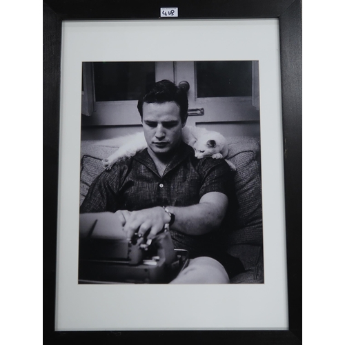 418 - A lot comprising four framed black and white photographic prints with a young Marlon Brando, Freddie... 