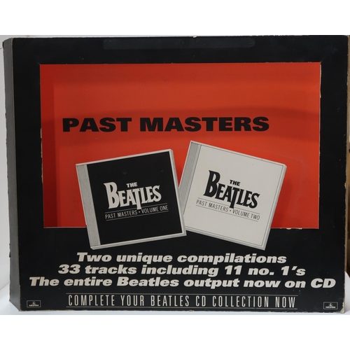 420 - The Beatles a record shop display for the release of Past Masters 33 track compilation compact discs