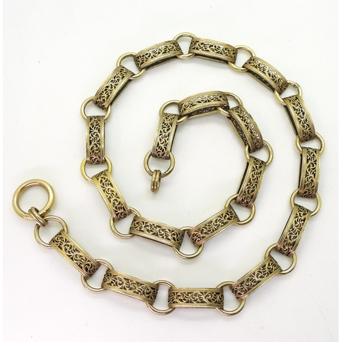 2700 - A VICTORIAN 15CT GOLD CHAINa traditional locket chain, with decorative filigree links, and oversize ... 