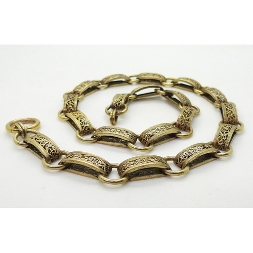 2700 - A VICTORIAN 15CT GOLD CHAINa traditional locket chain, with decorative filigree links, and oversize ... 