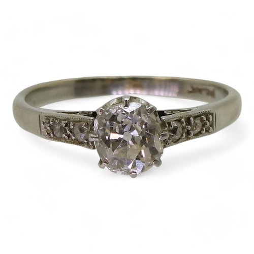 2704 - A VINTAGE DIAMOND SOLITAIRE RINGclassic platinum crown mount set with an estimated approx. 0.86cts c... 