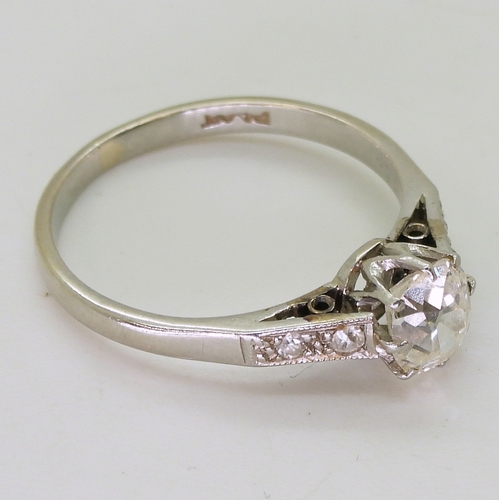 2704 - A VINTAGE DIAMOND SOLITAIRE RINGclassic platinum crown mount set with an estimated approx. 0.86cts c... 