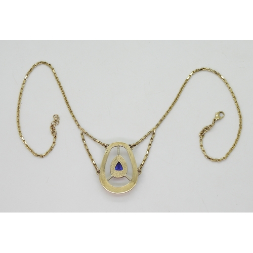 2707 - A 9CT GOLD TANZANITE NECKLACEbespoke made by Greig Thin-Smith of The Goldsmiths Workshop Dumfries, s... 