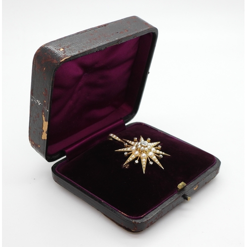 2710 - A VICTORIAN STAR PENDANT BROOCHthe mount in bright yellow metal, set with quality split pearls and o... 