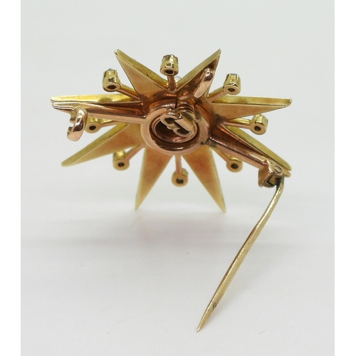 2710 - A VICTORIAN STAR PENDANT BROOCHthe mount in bright yellow metal, set with quality split pearls and o... 