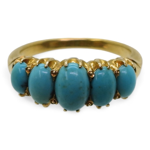 2712 - A TURQUOISE VINTAGE RINGthe classic mount is set  with five oval turquoise gemstones. The large... 