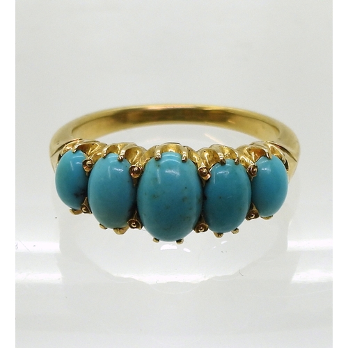 2712 - A TURQUOISE VINTAGE RINGthe classic mount is set  with five oval turquoise gemstones. The large... 