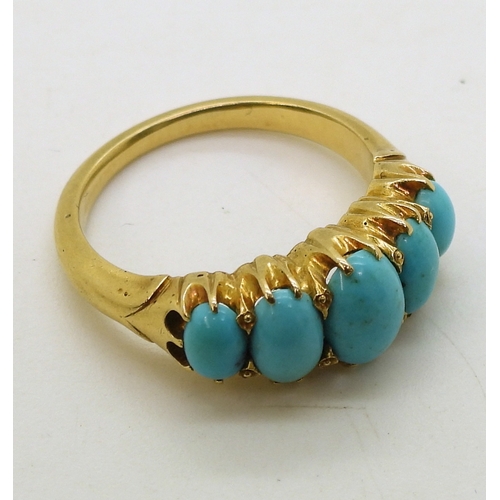 2712 - A TURQUOISE VINTAGE RINGthe classic mount is set  with five oval turquoise gemstones. The large... 