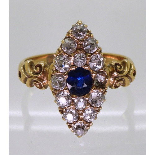 2714 - A SAPPHIRE & DIAMOND MARQUIS RINGwith pretty 18ct gold scroll mount, hallmarked Birmingham 1893,... 