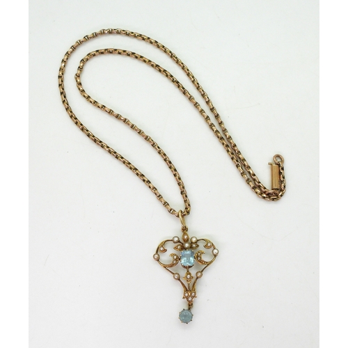 2715 - A 15CT GOLD EDWARDIAN PENDANTset with aquamarine and split pearls, length with bail 4cm, with a vint... 