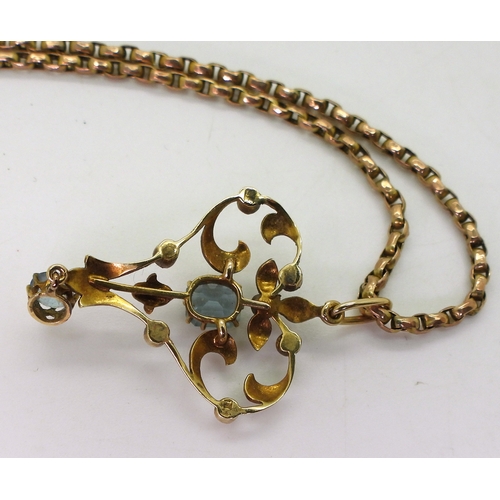 2715 - A 15CT GOLD EDWARDIAN PENDANTset with aquamarine and split pearls, length with bail 4cm, with a vint... 