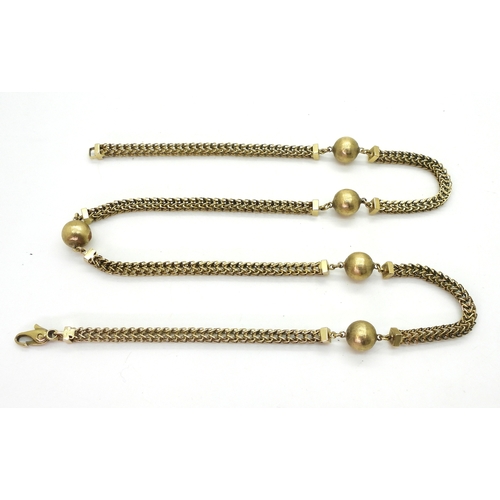 2717 - A 9CT GOLD FANCY CHAINwith textured beads and open herringbone style chain, length 63.5cm... 