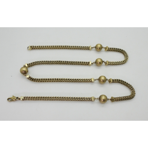 2717 - A 9CT GOLD FANCY CHAINwith textured beads and open herringbone style chain, length 63.5cm... 