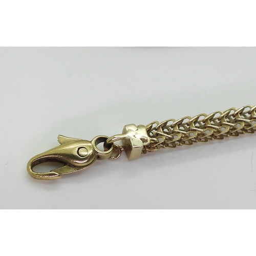 2717 - A 9CT GOLD FANCY CHAINwith textured beads and open herringbone style chain, length 63.5cm... 